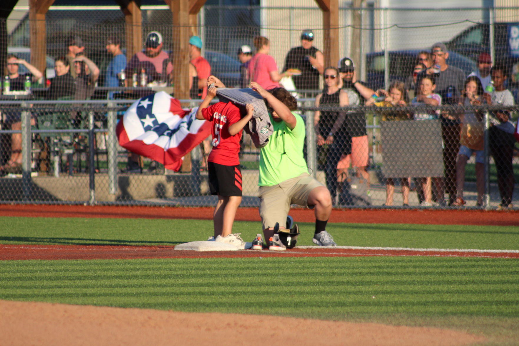 A young fan puts on Loggers gear